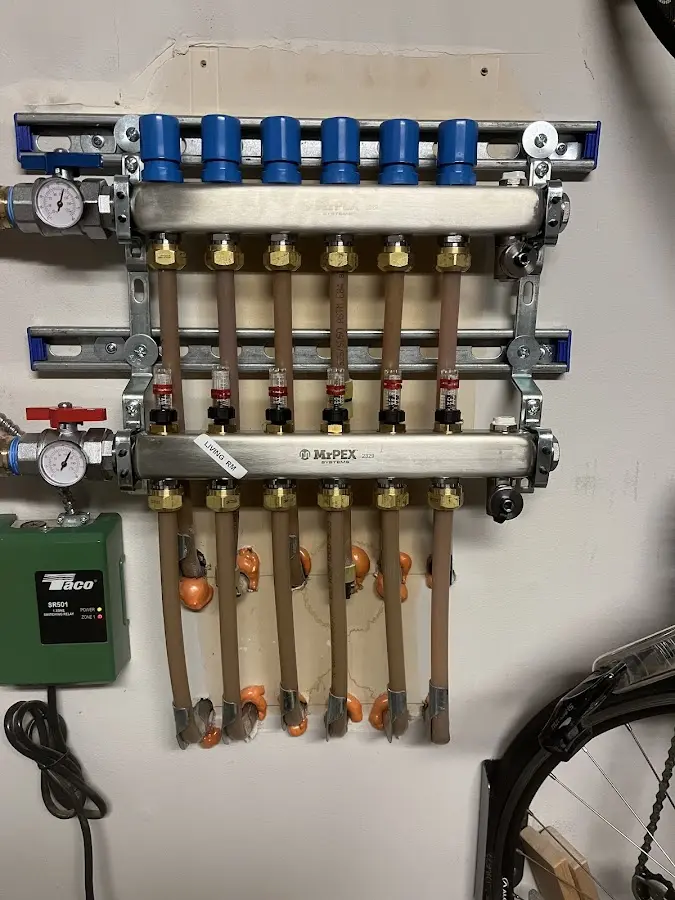 Plumber performing Water Heater Repair at a residential property in West Bridgewater